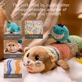 Four smaller detailed insets highlight specific features: 'Whale with texture' shows the blue corduroy-textured whale attachment; 'Crinkle paper' displays the multicolored square pattern fabric that makes crinkling sounds; 'Soft plush' showcases the otter's plush head material; and 'Bright colors' highlights the striped and patterned fabric sections with vibrant blue, orange and green colors. 