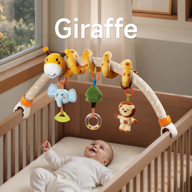 A baby lying in a crib, smiling and playing with a giraffe-themed arch toy. The toy features a plush giraffe, elephant teether, tree bead rattle, and lion BB device, securely attached to the crib for interactive playtime.