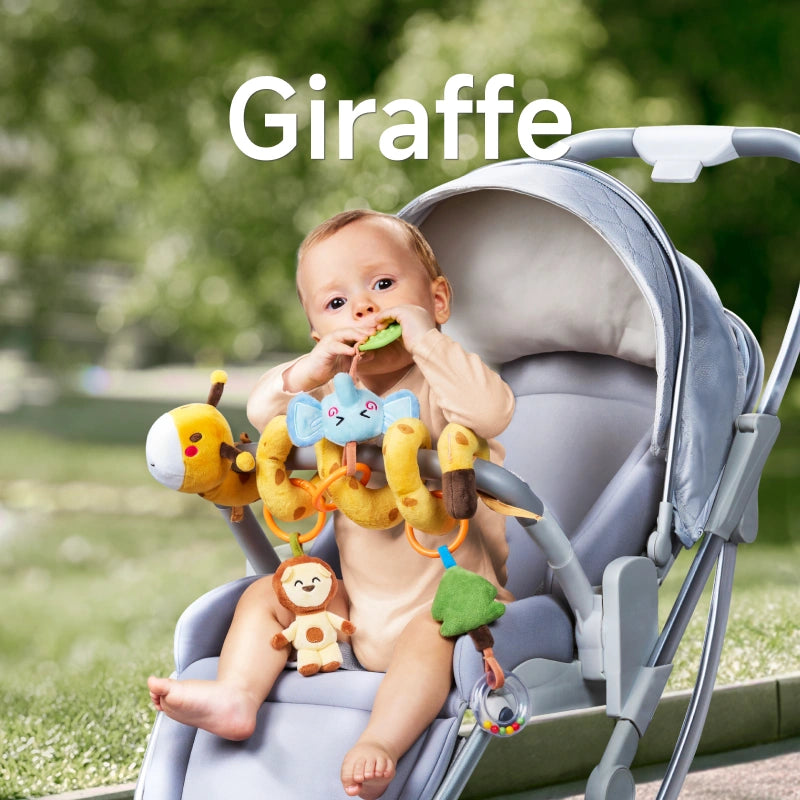 A baby sitting in a stroller, chewing on a green elephant-shaped teether from a giraffe-themed spiral toy. The toy features a plush giraffe, lion, tree bead, and bead rattle, securely attached to the stroller for interactive fun.