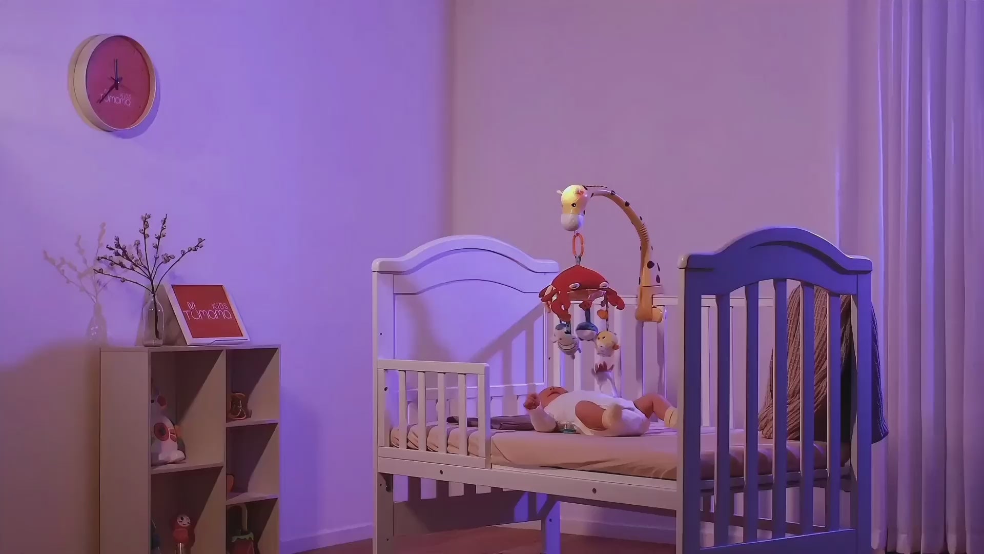 Baby-playing-and-sleeping-with-the-projection-night-light-on