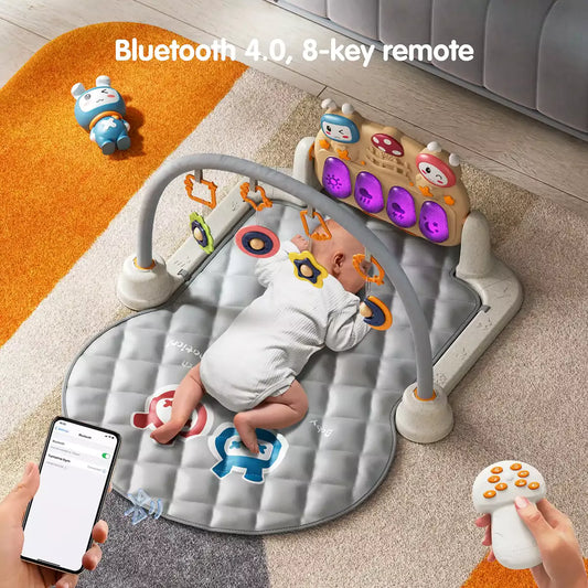 Newborn baby play gym with kick piano